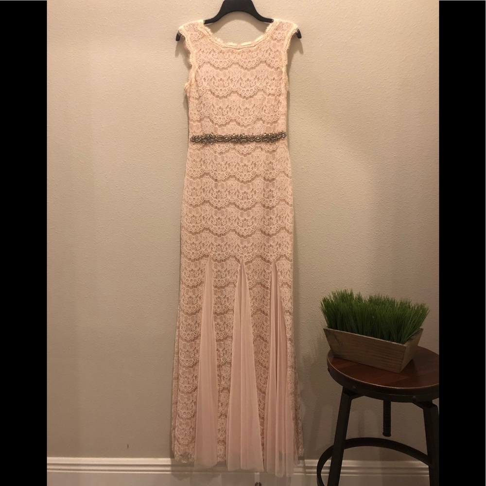 Elegant evening dress by Betsy Adam. Size 8